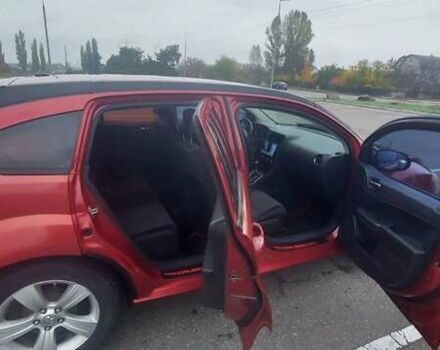 Додж Калибер 2010 в Киеве на Automoto.ua Красный Додж Калибер, объемом двигателя 2 л и пробегом 255 тыс. км за 7000 $, фото 2 на Automoto.ua