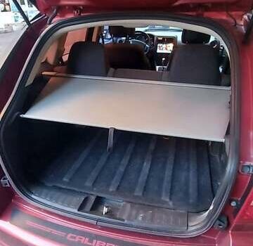 Додж Калибер 2010 в Киеве на Automoto.ua Красный Додж Калибер, объемом двигателя 2 л и пробегом 255 тыс. км за 7000 $, фото 11 на Automoto.ua