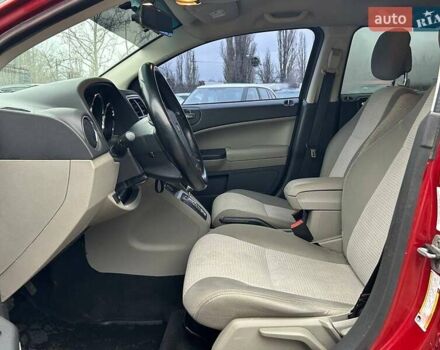 Красный Додж Калибер, объемом двигателя 2 л и пробегом 219 тыс. км за 7400 $, фото 12 на Automoto.ua