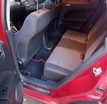 Додж Калибер 2010 в Киеве на Automoto.ua Красный Додж Калибер, объемом двигателя 2 л и пробегом 255 тыс. км за 7000 $, фото 14 на Automoto.ua