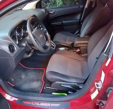 Додж Калибер 2010 в Киеве на Automoto.ua Красный Додж Калибер, объемом двигателя 2 л и пробегом 255 тыс. км за 7000 $, фото 17 на Automoto.ua