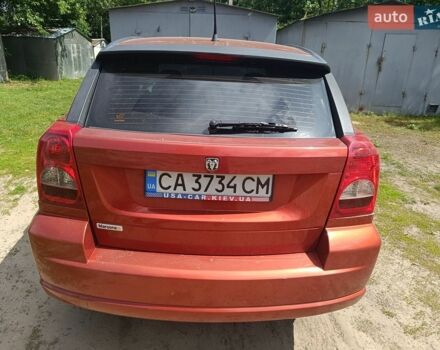Красный Додж Калибер, объемом двигателя 2 л и пробегом 241 тыс. км за 6300 $, фото 1 на Automoto.ua