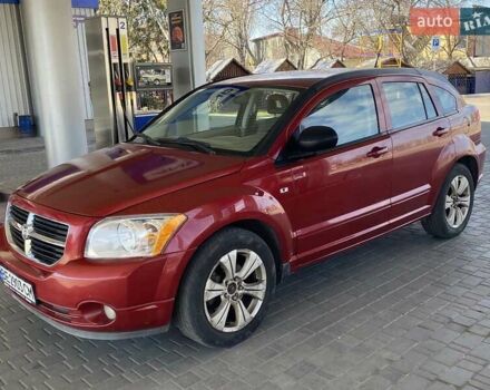 Красный Додж Калибер, объемом двигателя 2 л и пробегом 206 тыс. км за 6900 $, фото 1 на Automoto.ua
