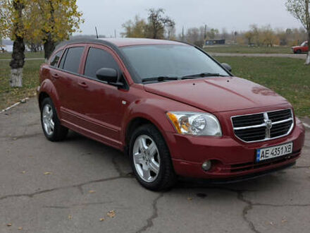 Красный Додж Калибер, объемом двигателя 2 л и пробегом 205 тыс. км за 7800 $, фото 1 на Automoto.ua