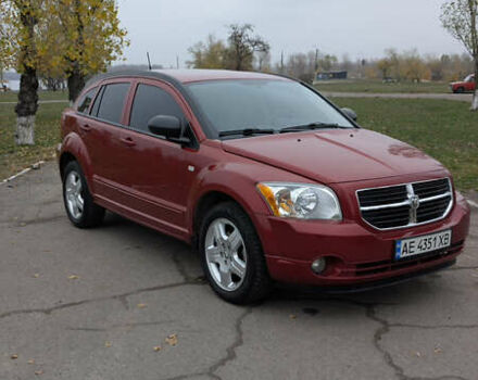 Красный Додж Калибер, объемом двигателя 2 л и пробегом 205 тыс. км за 7800 $, фото 1 на Automoto.ua