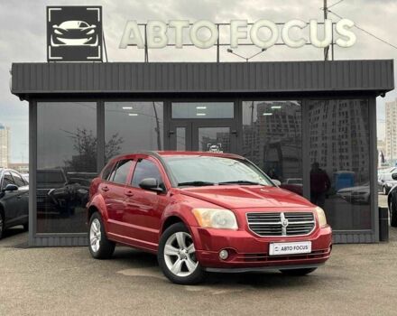 Красный Додж Калибер, объемом двигателя 2 л и пробегом 255 тыс. км за 6490 $, фото 1 на Automoto.ua