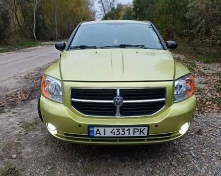 Зеленый Додж Калибер, объемом двигателя 2 л и пробегом 250 тыс. км за 7500 $, фото 1 на Automoto.ua