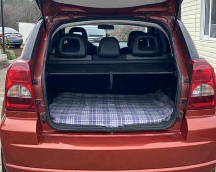 Оранжевый Додж Калибер, объемом двигателя 2 л и пробегом 294 тыс. км за 7800 $, фото 14 на Automoto.ua