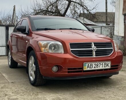 Оранжевый Додж Калибер, объемом двигателя 2 л и пробегом 294 тыс. км за 7800 $, фото 1 на Automoto.ua
