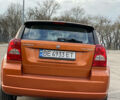 Оранжевый Додж Калибер, объемом двигателя 2 л и пробегом 195 тыс. км за 8499 $, фото 9 на Automoto.ua