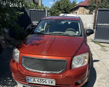 Оранжевый Додж Калибер, объемом двигателя 2 л и пробегом 135 тыс. км за 5800 $, фото 1 на Automoto.ua