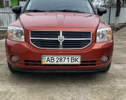 Оранжевый Додж Калибер, объемом двигателя 2 л и пробегом 294 тыс. км за 7800 $, фото 1 на Automoto.ua