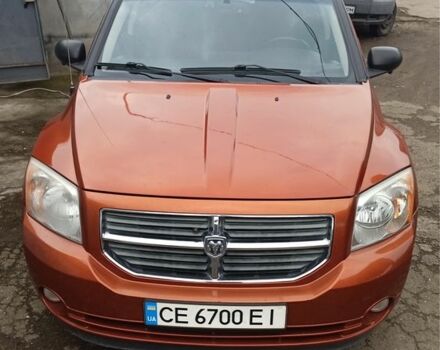 Оранжевый Додж Калибер, объемом двигателя 2 л и пробегом 300 тыс. км за 6800 $, фото 1 на Automoto.ua