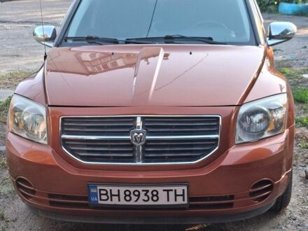 Помаранчевий Додж Caliber, об'ємом двигуна 2 л та пробігом 310 тис. км за 7100 $, фото 1 на Automoto.ua