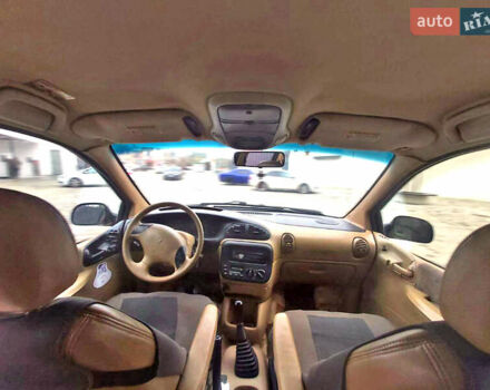 Черный Додж Караван, объемом двигателя 2.5 л и пробегом 515 тыс. км за 3900 $, фото 12 на Automoto.ua