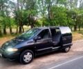 Черный Додж Караван, объемом двигателя 2.5 л и пробегом 302 тыс. км за 3500 $, фото 1 на Automoto.ua