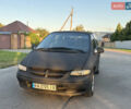 Черный Додж Караван, объемом двигателя 2.5 л и пробегом 415 тыс. км за 2900 $, фото 1 на Automoto.ua