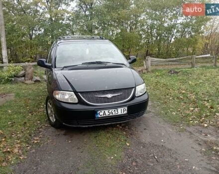 Черный Додж Караван, объемом двигателя 2.5 л и пробегом 360 тыс. км за 4700 $, фото 1 на Automoto.ua