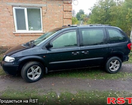 Черный Додж Караван, объемом двигателя 2.5 л и пробегом 316 тыс. км за 5000 $, фото 3 на Automoto.ua