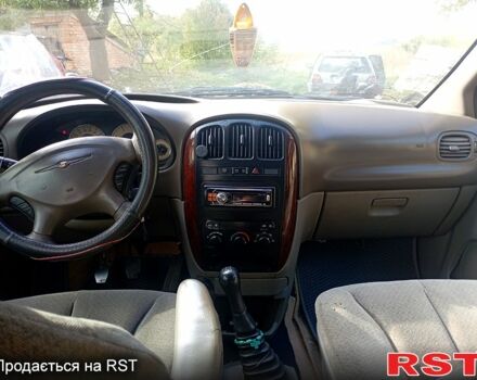 Черный Додж Караван, объемом двигателя 2.5 л и пробегом 316 тыс. км за 5000 $, фото 5 на Automoto.ua