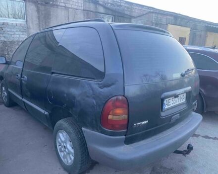 Черный Додж Караван, объемом двигателя 4.3 л и пробегом 250 тыс. км за 2300 $, фото 1 на Automoto.ua