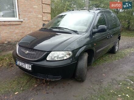 Черный Додж Караван, объемом двигателя 2.5 л и пробегом 360 тыс. км за 4700 $, фото 1 на Automoto.ua