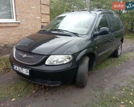 Чорний Додж Caravan, об'ємом двигуна 2.5 л та пробігом 360 тис. км за 4700 $, фото 1 на Automoto.ua