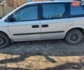 Серый Додж Караван, объемом двигателя 2.43 л и пробегом 215 тыс. км за 4500 $, фото 1 на Automoto.ua