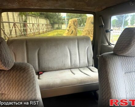 Зелений Додж Caravan, об'ємом двигуна 2 л та пробігом 150 тис. км за 2250 $, фото 7 на Automoto.ua