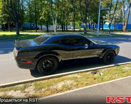 Черный Додж Челенджер, объемом двигателя 3.6 л и пробегом 138 тыс. км за 21000 $, фото 7 на Automoto.ua