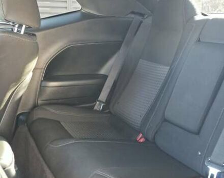 Черный Додж Челенджер, объемом двигателя 5.65 л и пробегом 139 тыс. км за 27000 $, фото 16 на Automoto.ua