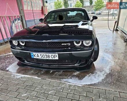 Чорний Додж Challenger, об'ємом двигуна 5.65 л та пробігом 192 тис. км за 19200 $, фото 1 на Automoto.ua
