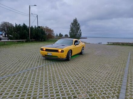 Красный Додж Челенджер, объемом двигателя 3.6 л и пробегом 260 тыс. км за 12500 $, фото 1 на Automoto.ua