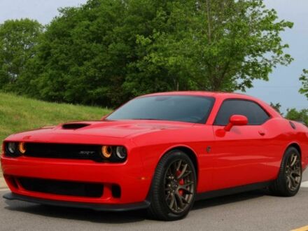 Червоний Додж Challenger, об'ємом двигуна 6.2 л та пробігом 69 тис. км за 25000 $, фото 1 на Automoto.ua