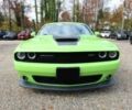 Зеленый Додж Челенджер, объемом двигателя 6.4 л и пробегом 77 тыс. км за 7800 $, фото 1 на Automoto.ua
