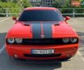 Помаранчевий Додж Challenger, об'ємом двигуна 6.06 л та пробігом 97 тис. км за 25900 $, фото 1 на Automoto.ua