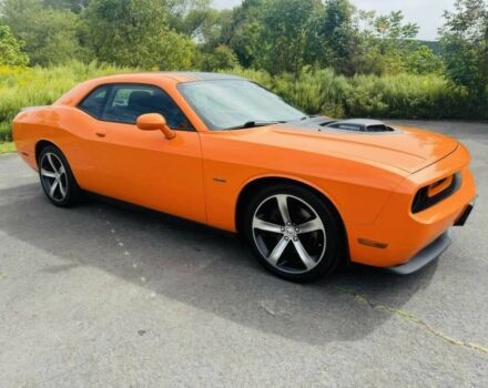 Оранжевый Додж Челенджер, объемом двигателя 5.7 л и пробегом 88 тыс. км за 4100 $, фото 1 на Automoto.ua