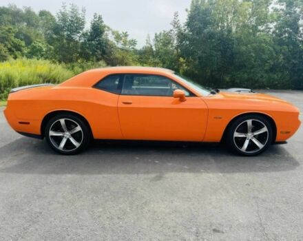 Оранжевый Додж Челенджер, объемом двигателя 5.7 л и пробегом 88 тыс. км за 4100 $, фото 2 на Automoto.ua