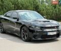 Черный Додж Чарджер, объемом двигателя 5.7 л и пробегом 164 тыс. км за 23500 $, фото 1 на Automoto.ua