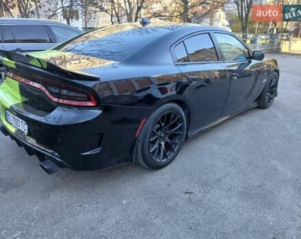 Черный Додж Чарджер, объемом двигателя 6.41 л и пробегом 80 тыс. км за 33000 $, фото 2 на Automoto.ua