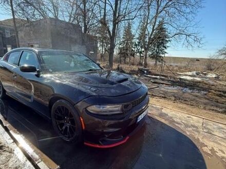 Черный Додж Чарджер, объемом двигателя 3.6 л и пробегом 318 тыс. км за 13000 $, фото 1 на Automoto.ua
