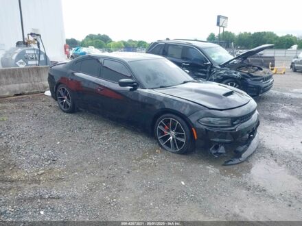 Додж Charger 2016 у Львові на Automoto.ua Чорний Додж Charger, об'ємом двигуна 6.4 л та пробігом 105 тис. км за 389 $, фото 1 на Automoto.ua