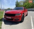 Красный Додж Чарджер, объемом двигателя 3.6 л и пробегом 205 тыс. км за 14900 $, фото 1 на Automoto.ua