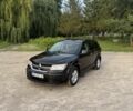 Чорний Додж Інша, об'ємом двигуна 2.4 л та пробігом 255 тис. км за 7000 $, фото 1 на Automoto.ua