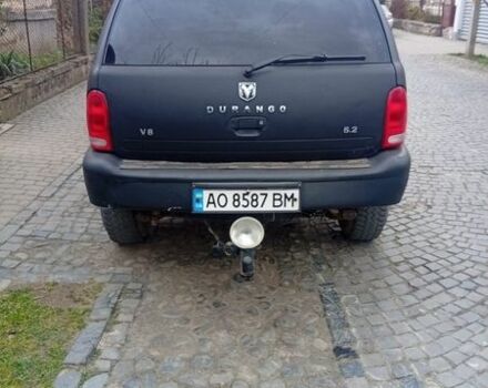 Черный Додж Дюранго, объемом двигателя 5.2 л и пробегом 186 тыс. км за 3900 $, фото 1 на Automoto.ua