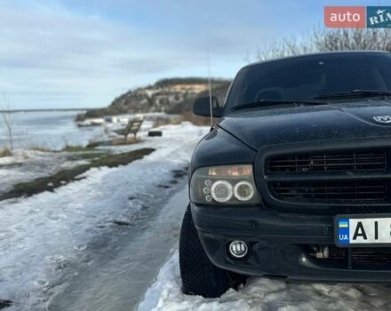 Черный Додж Дюранго, объемом двигателя 4.7 л и пробегом 165 тыс. км за 9000 $, фото 1 на Automoto.ua