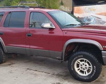 Красный Додж Дюранго, объемом двигателя 5.2 л и пробегом 185 тыс. км за 10000 $, фото 1 на Automoto.ua