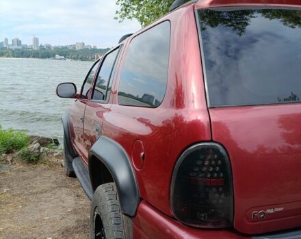 Красный Додж Дюранго, объемом двигателя 5 л и пробегом 352 тыс. км за 8500 $, фото 1 на Automoto.ua