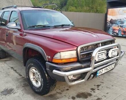 Красный Додж Дюранго, объемом двигателя 5.2 л и пробегом 185 тыс. км за 10000 $, фото 1 на Automoto.ua