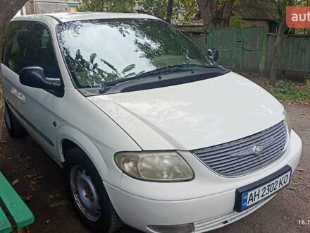 Білий Додж Гранд Караван, об'ємом двигуна 2.5 л та пробігом 316 тис. км за 5000 $, фото 1 на Automoto.ua